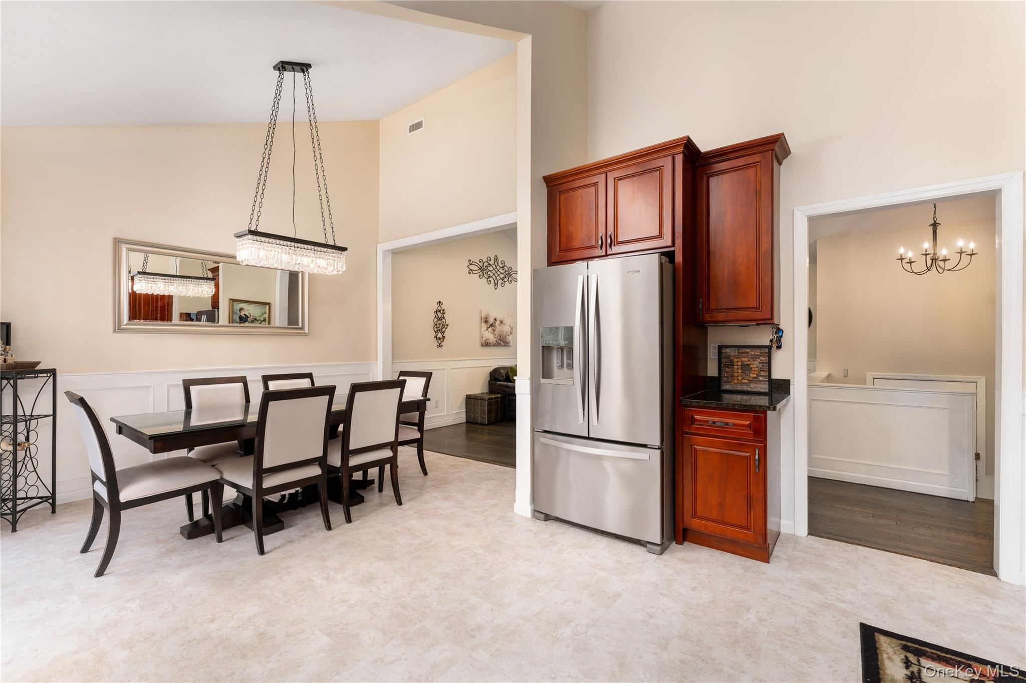 591 Meadow Road Kings Park, NY 11754 - Photo 26 of 50 a kitchen with stainless steel appliances a refrigerator and microwave