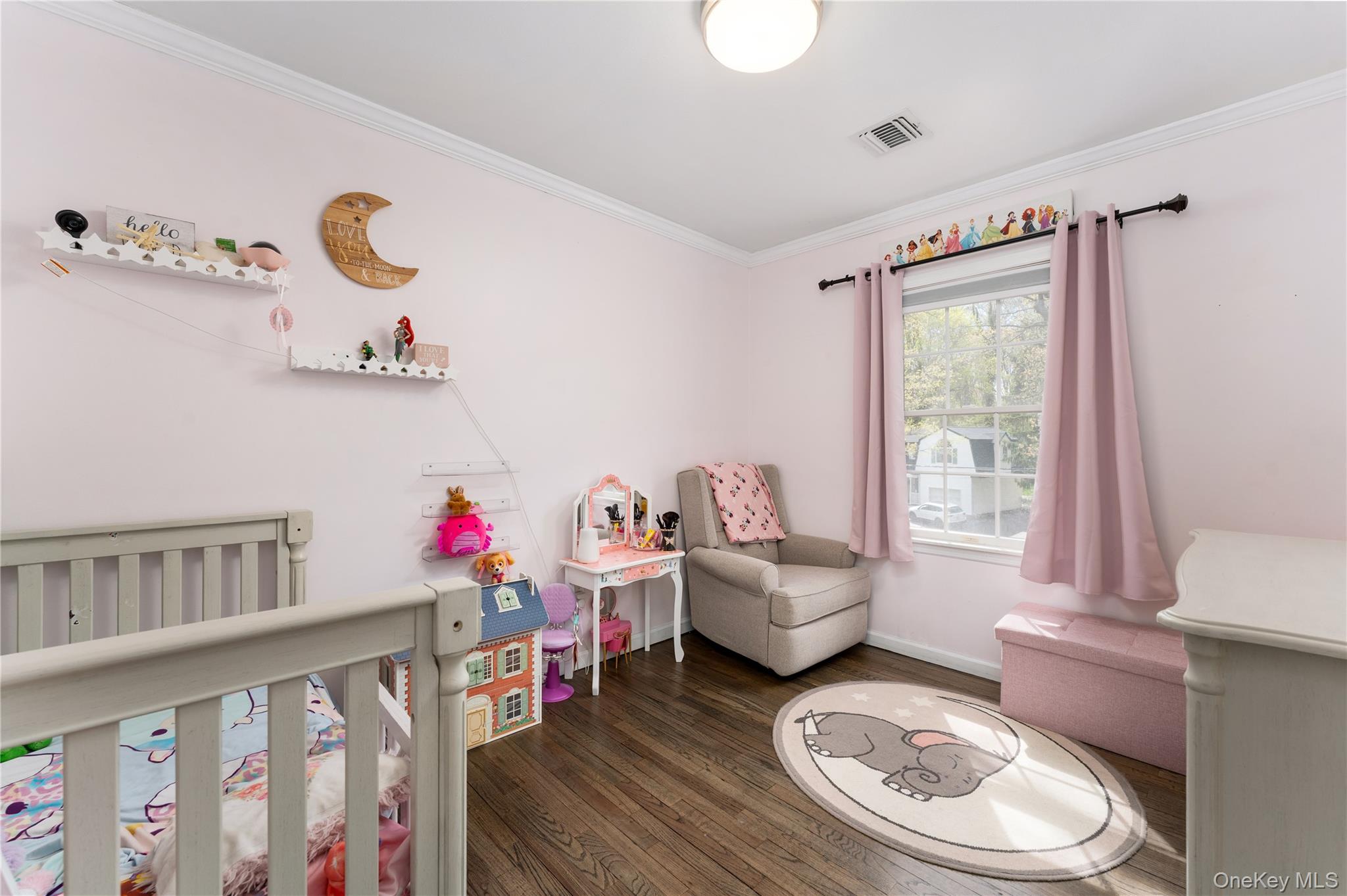591 Meadow Road Kings Park, NY 11754 - Photo 28 of 50 a living room with furniture and a wooden floor