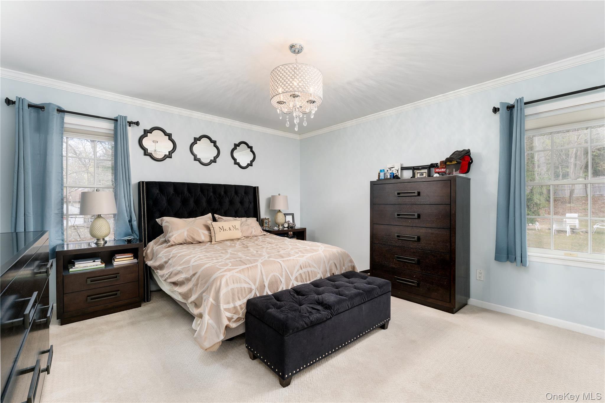 591 Meadow Road Kings Park, NY 11754 - Photo 30 of 50 a bedroom with a bed window and a table