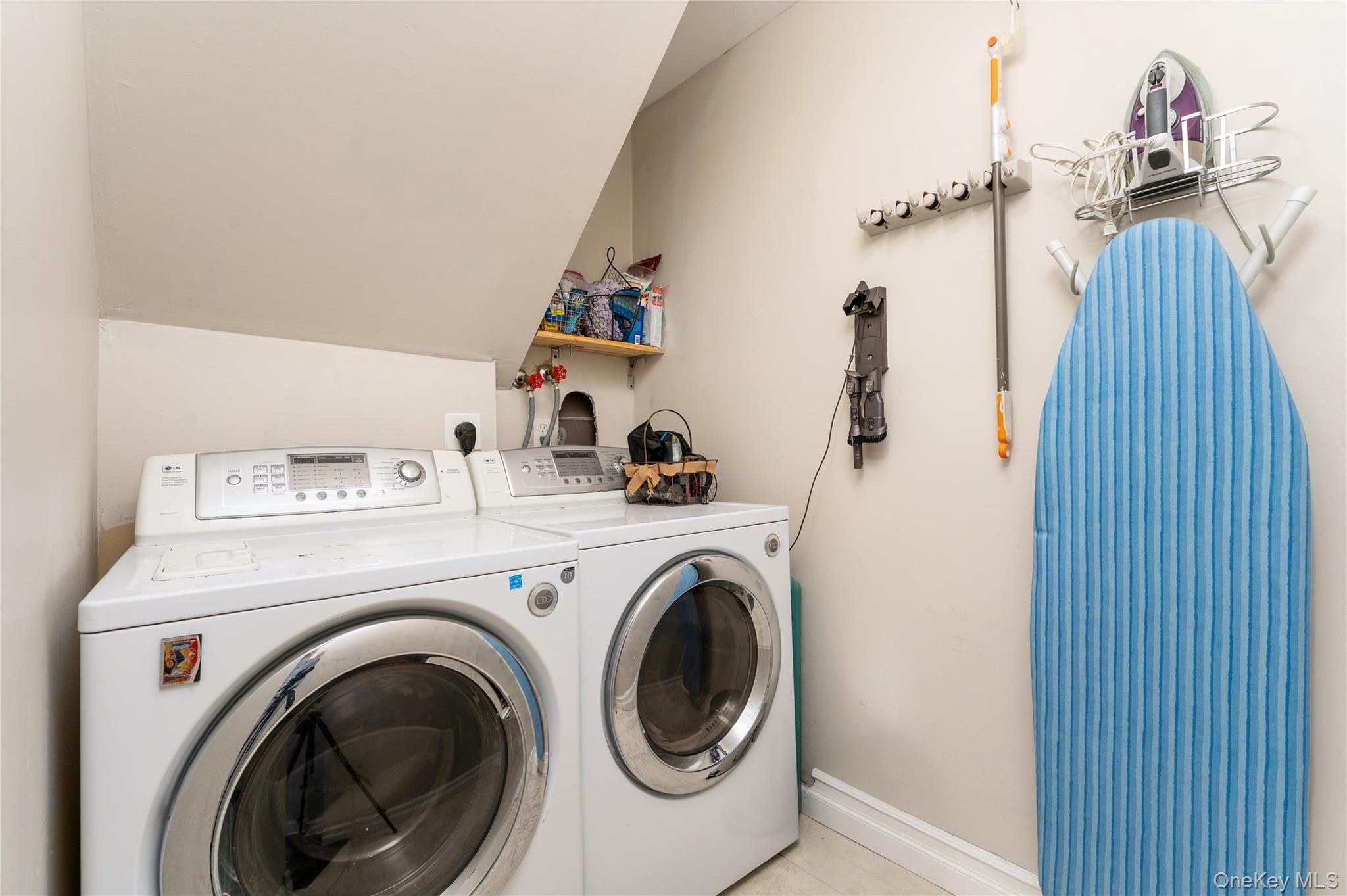 591 Meadow Road Kings Park, NY 11754 - Photo 34 of 50 a utility room with dryer and washer