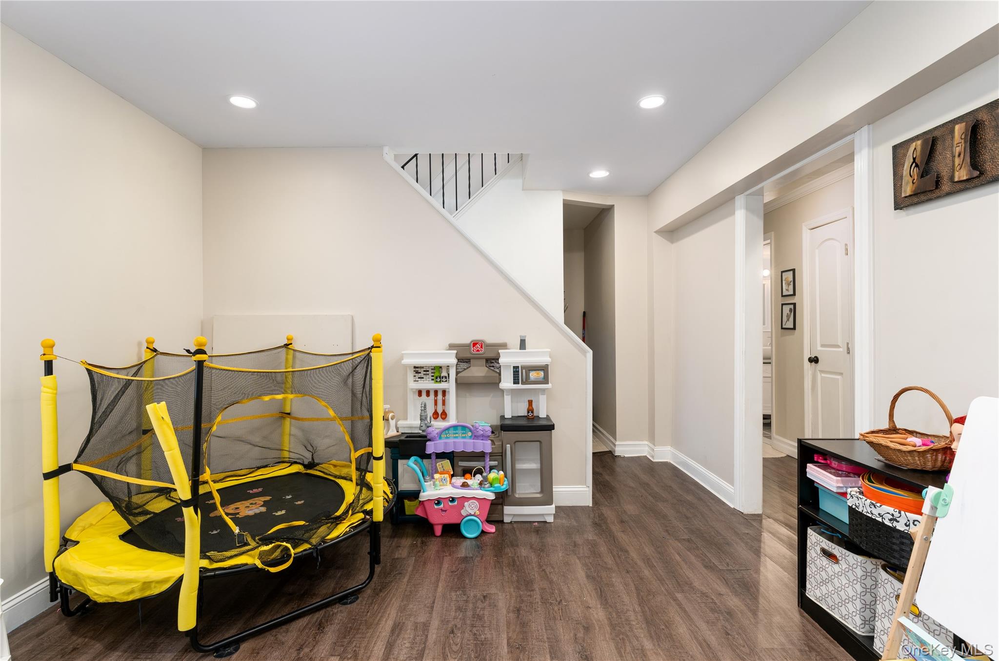 591 Meadow Road Kings Park, NY 11754 - Photo 37 of 50 a bedroom with furniture and wooden floor