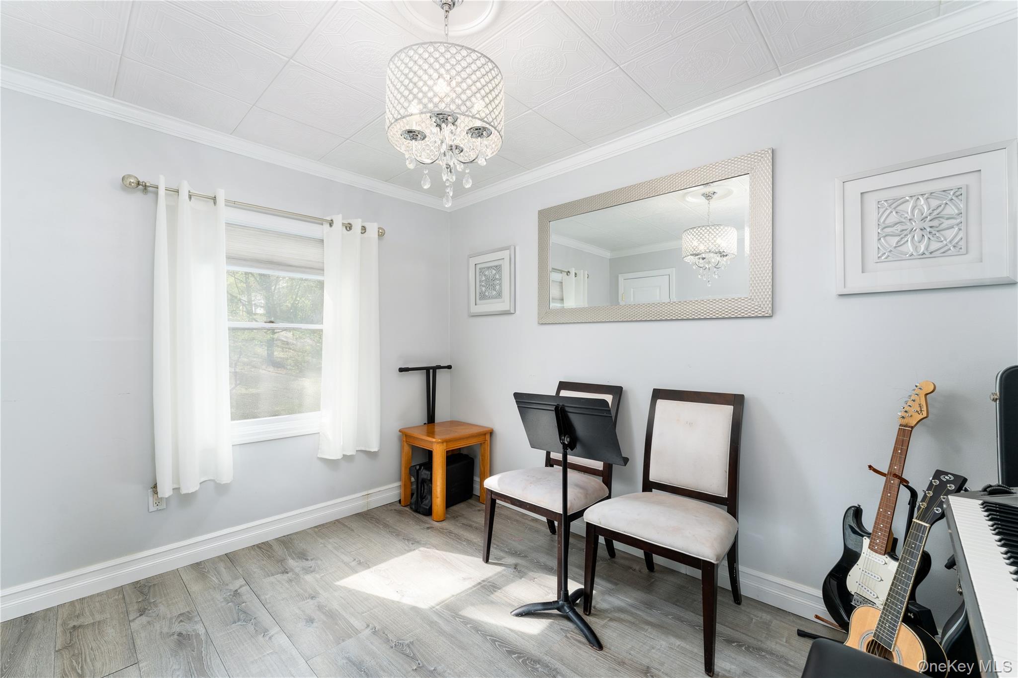 591 Meadow Road Kings Park, NY 11754 - Photo 38 of 50 a view of a workspace with furniture and a window