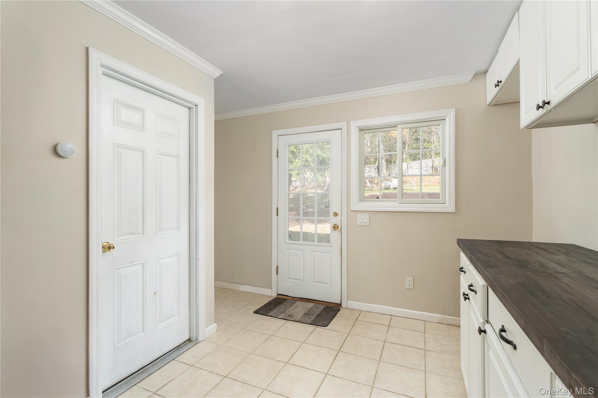 591 Meadow Road Kings Park, NY 11754 - Photo 39 of 50 a view of an empty room and window