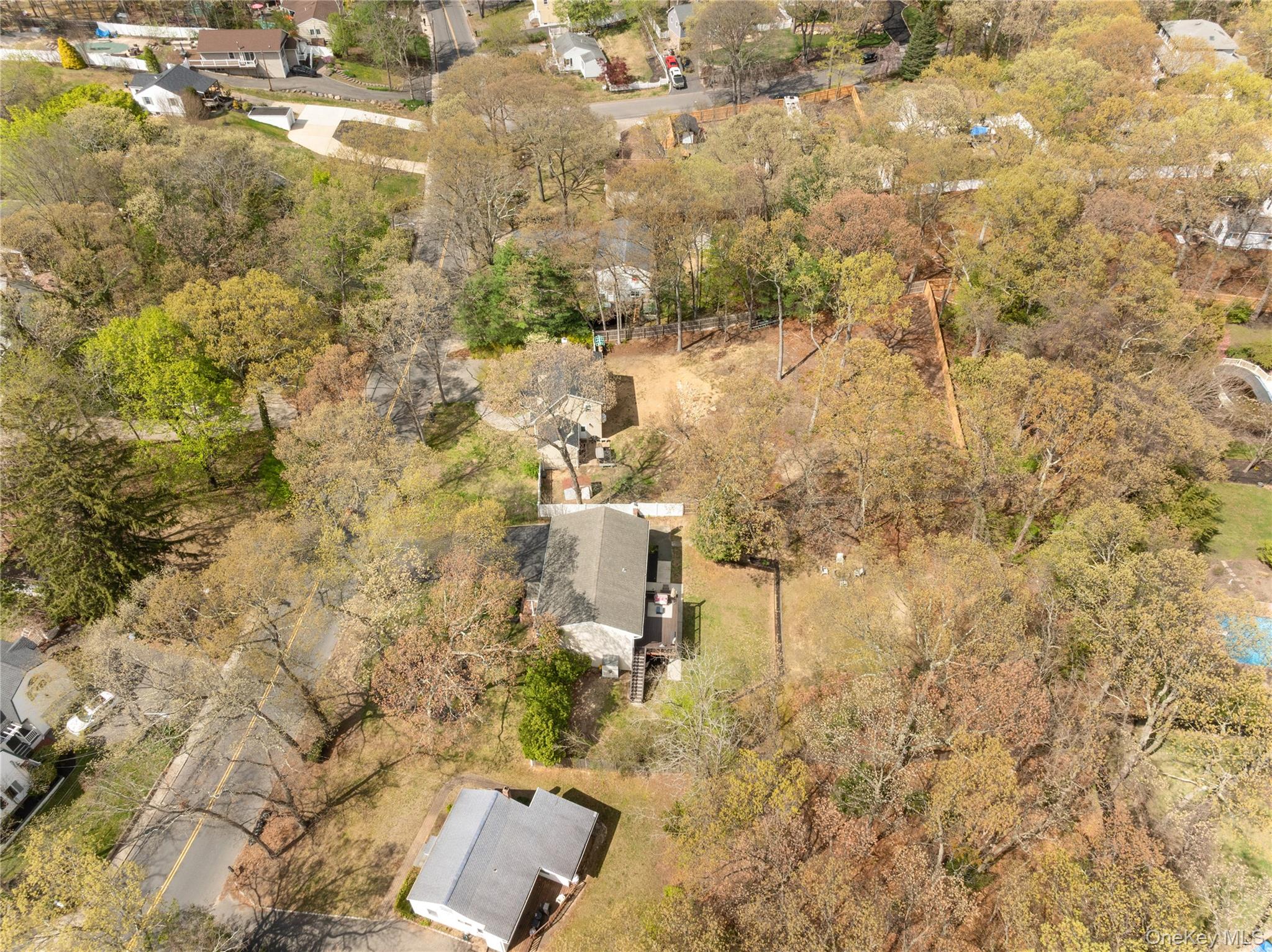591 Meadow Road Kings Park, NY 11754 - Photo 43 of 50 a view of residential houses with yard