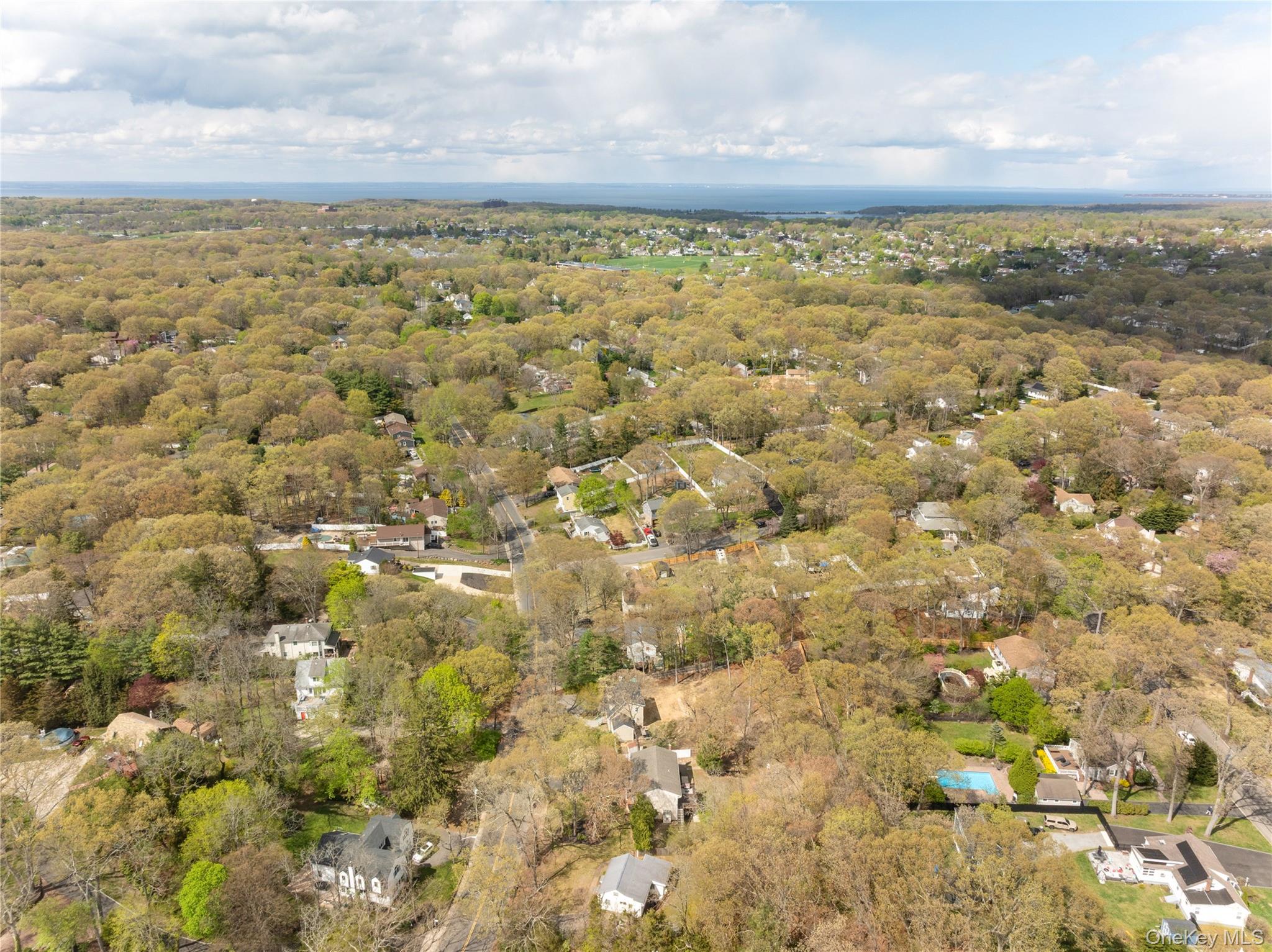 591 Meadow Road Kings Park, NY 11754 - Photo 46 of 50 a view of a field with an outdoor space