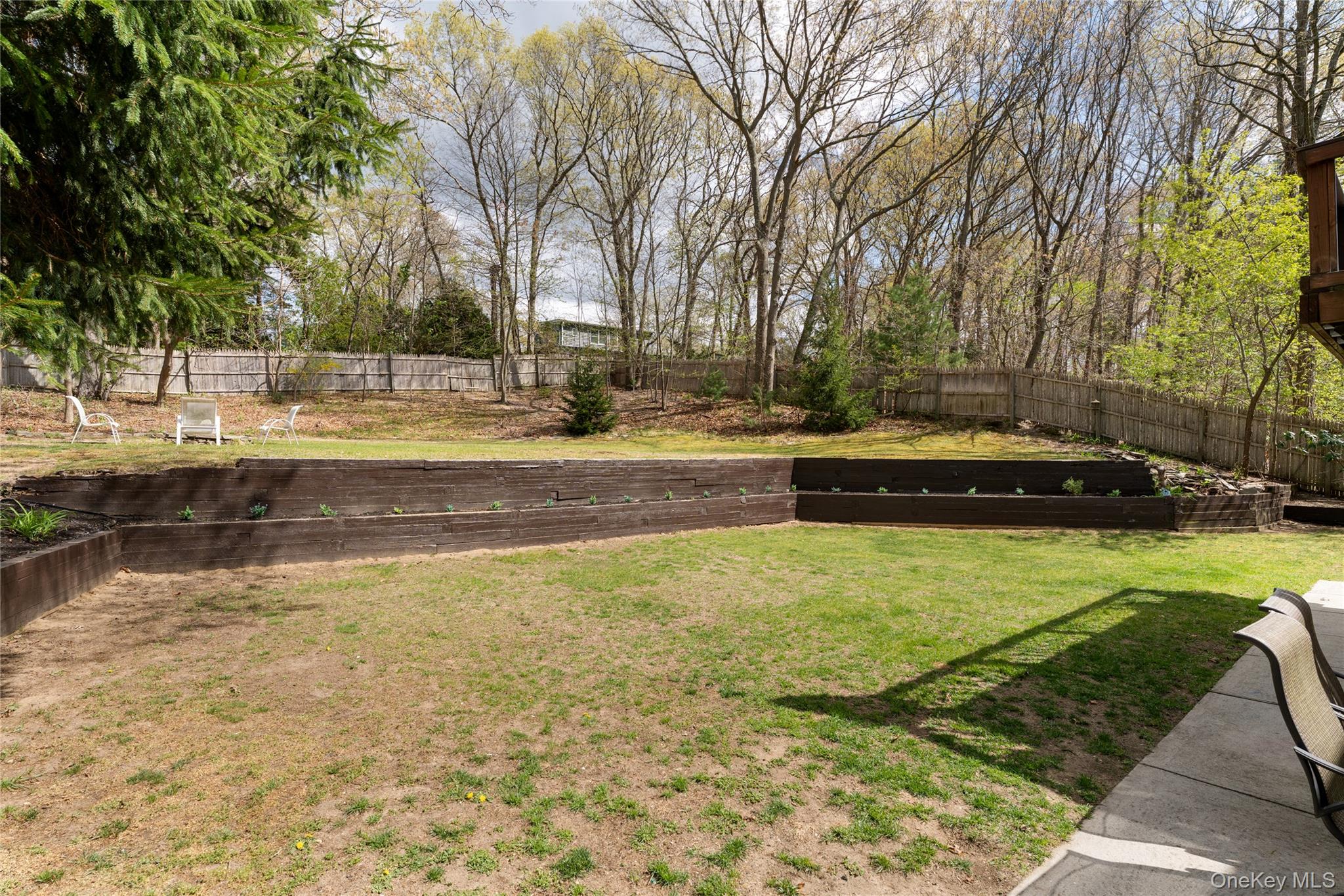 591 Meadow Road Kings Park, NY 11754 - Photo 9 of 50 a view of a swimming pool with a patio