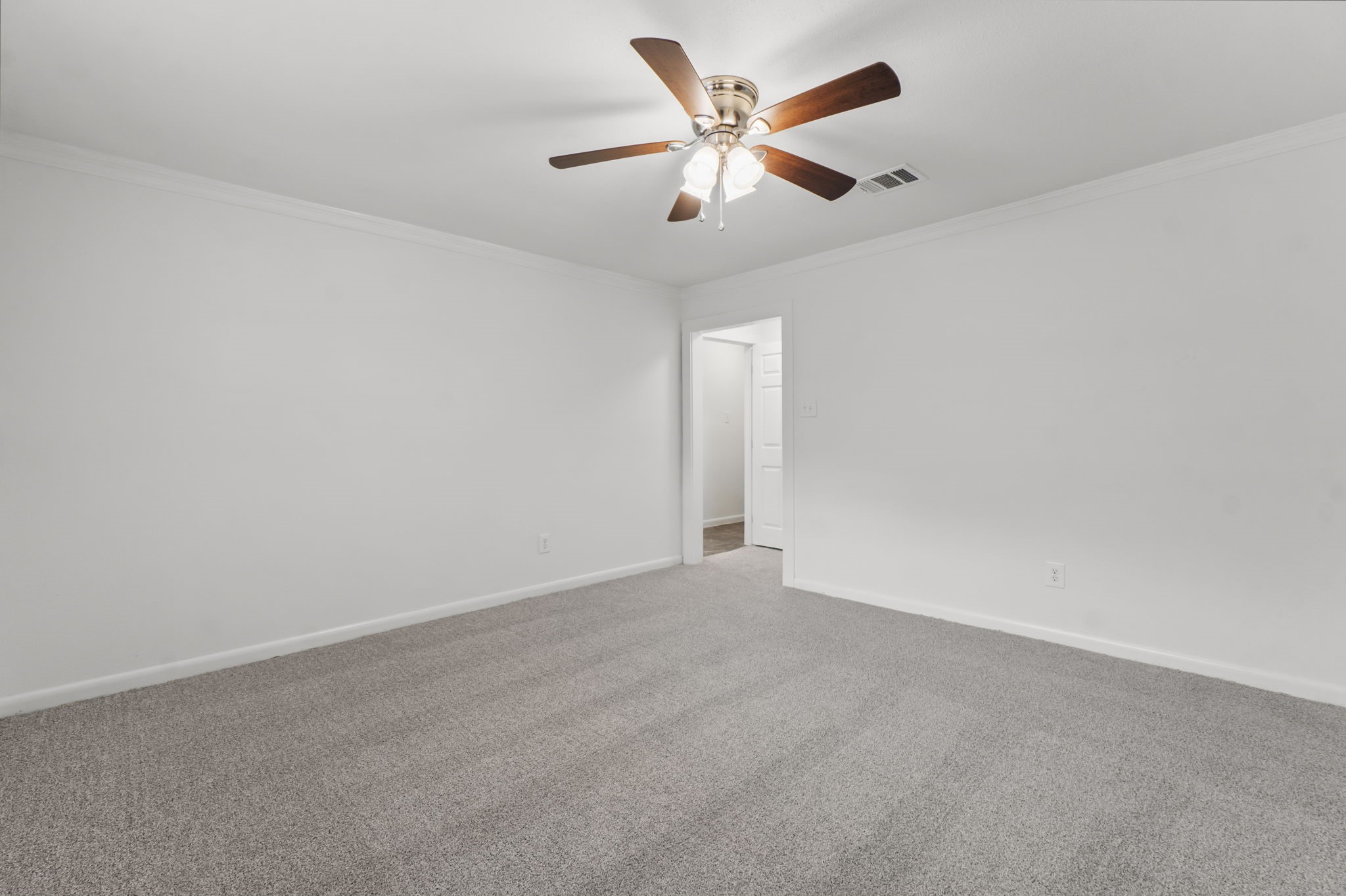 3223 Kentwood Drive Spring, TX 77380 - Photo 17 of 31 Ample floor space makes it easy to accommodate oversized furniture, while the room’s clean lines and natural light enhance the open and airy feel. Positioned privately within the home, it offers a quiet escape from the main living areas.