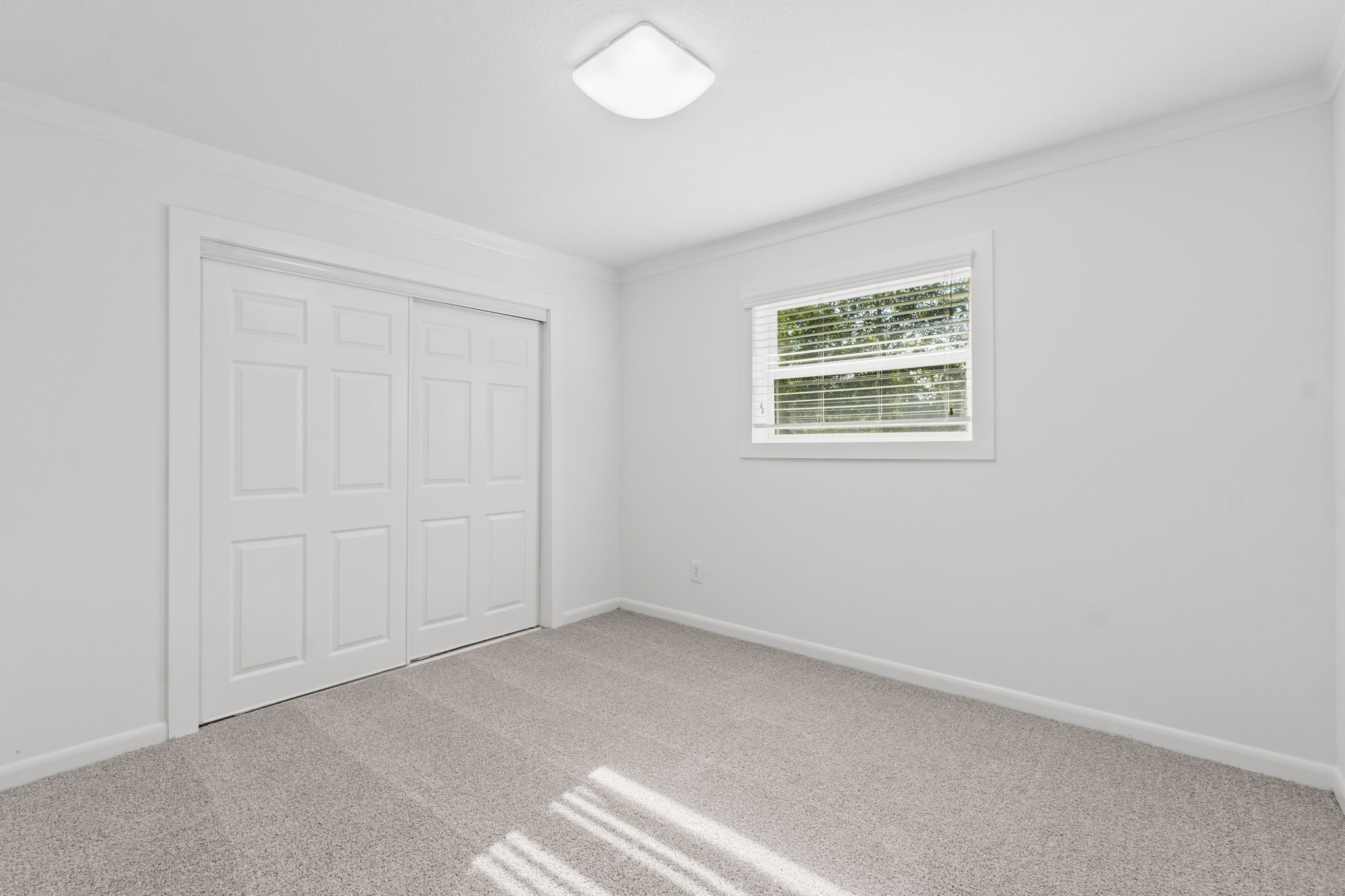 3223 Kentwood Drive Spring, TX 77380 - Photo 25 of 31 Another well-sized bedroom featuring natural light and updated finishes.