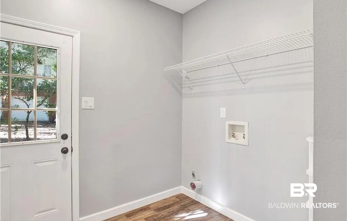 632 Ridgewood Drive Daphne, AL 36526 - Photo 22 of 36 Laundry area with washer hookup, hardwood / wood-style floors, and electric dryer hookup