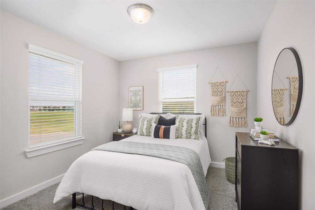 4304 Stonybrook Road Arlington, TX 76005 - Photo 11 of 17 a bedroom with a bed and a window