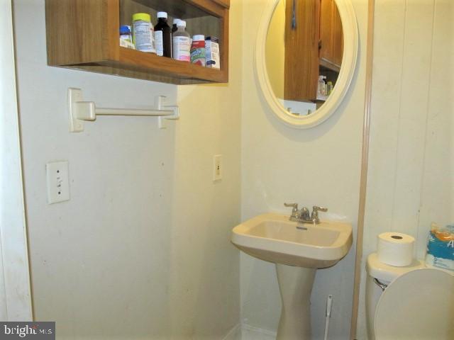 724 South Camp Meade Road Linthicum, MD 21090 - Photo 24 of 31 1st floor half bath