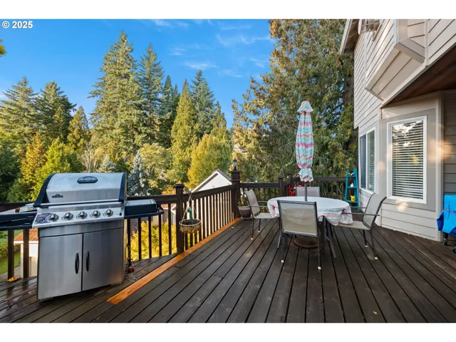 a view of a patio with wooden floor