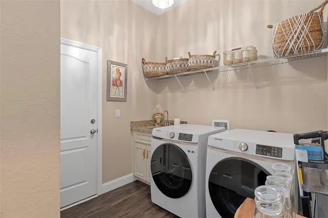 a utility room with dryer and washer