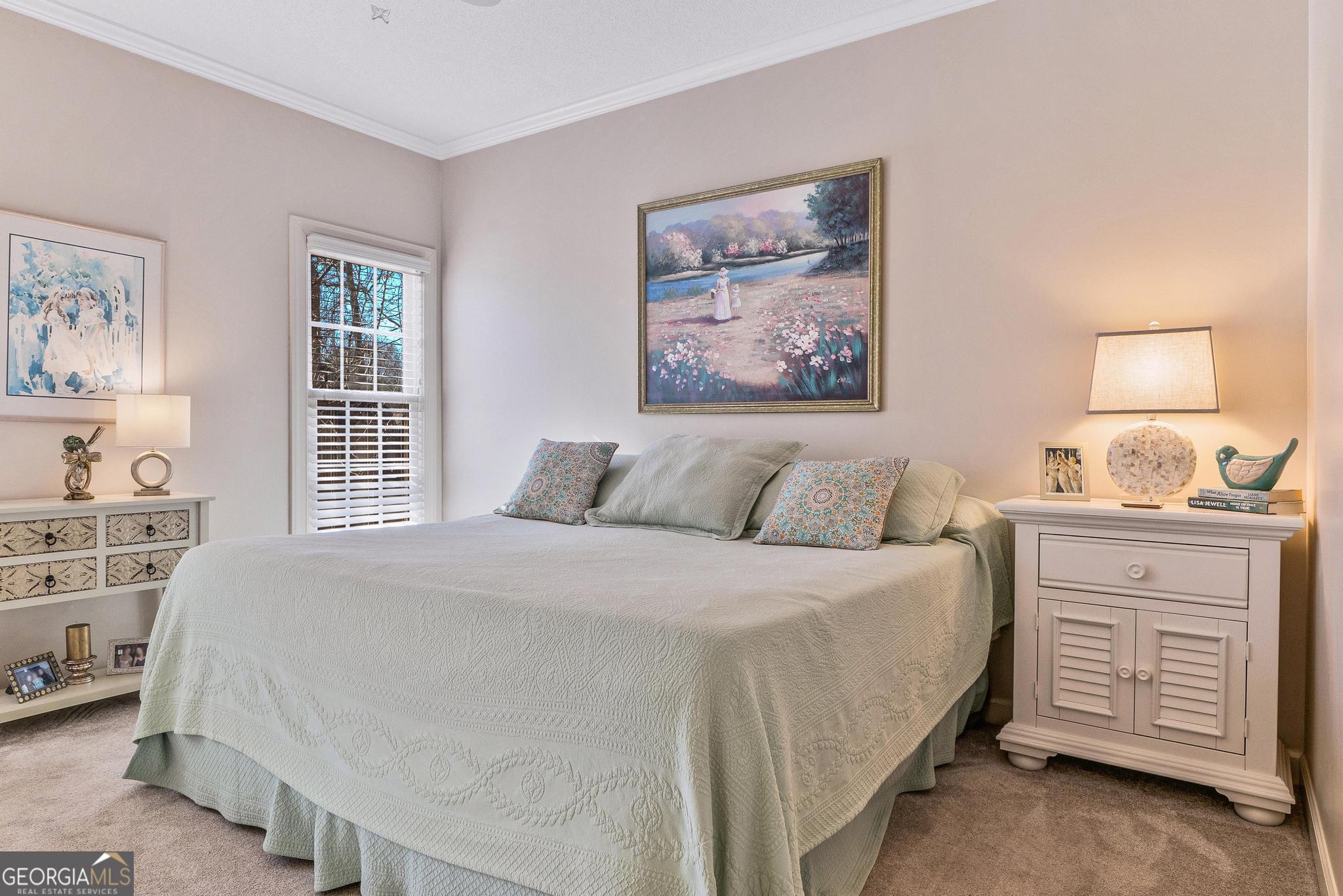 204 Carriage Way Macon, GA 31210 - Photo 22 of 28 a bedroom with a bed and a window