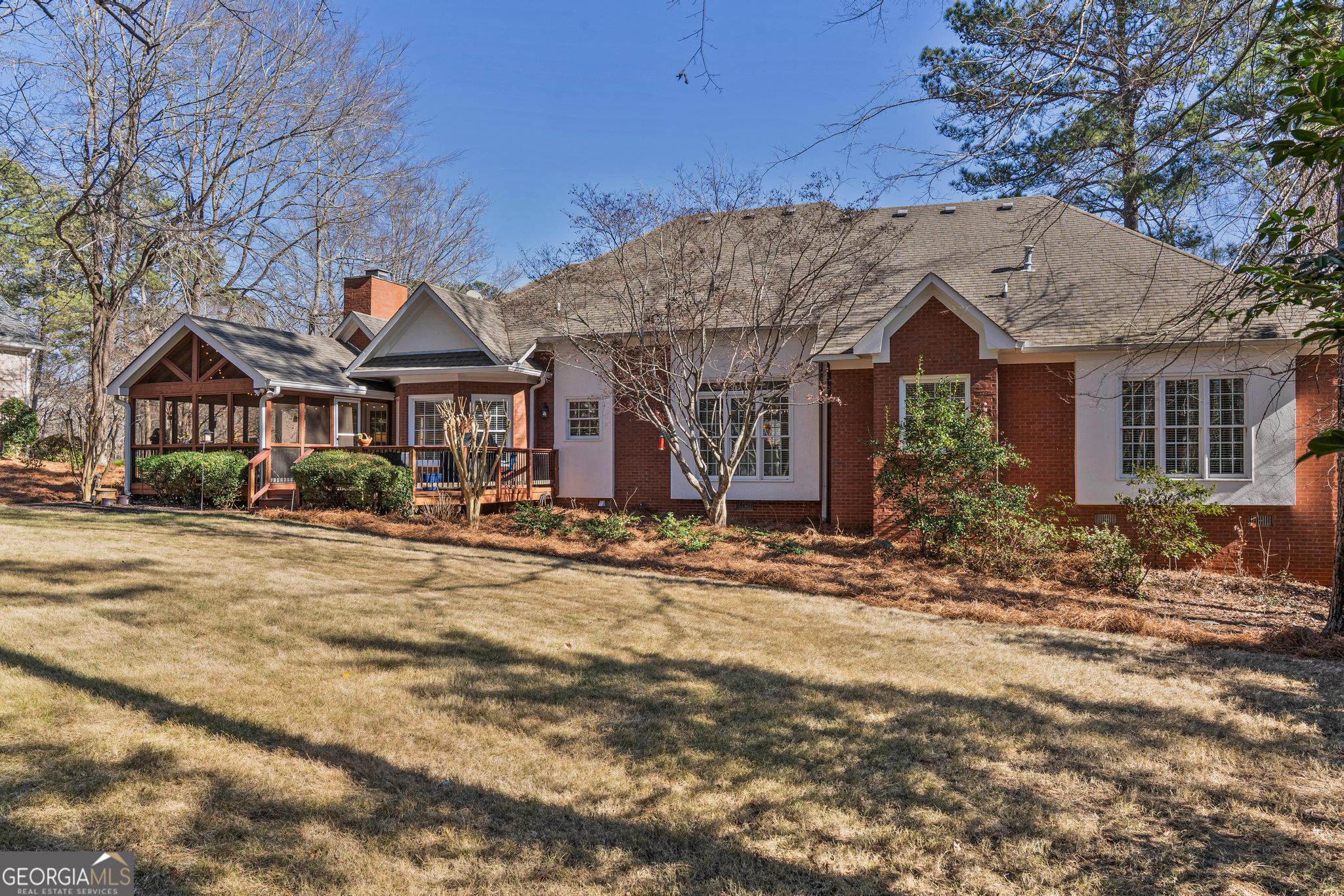 204 Carriage Way Macon, GA 31210 - Photo 3 of 28 a front view of a house with a yard