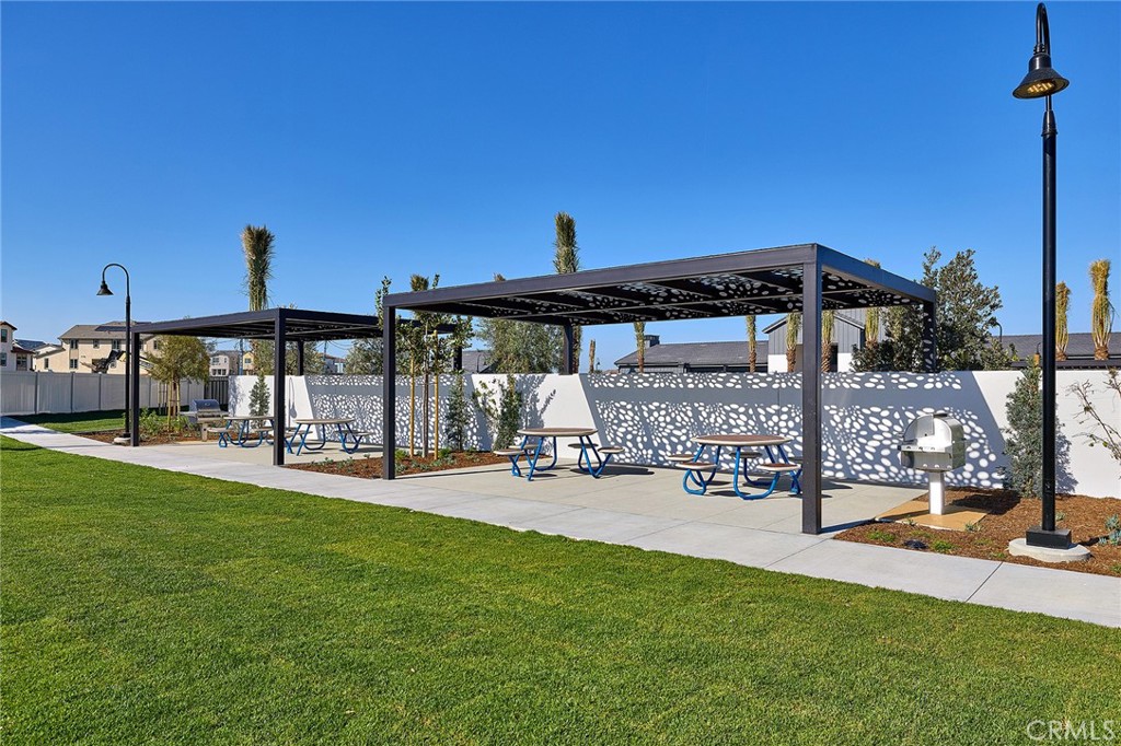 6059 Burren Way Eastvale, CA 92880 - Photo 23 of 30 a view of a house with sitting area and porch