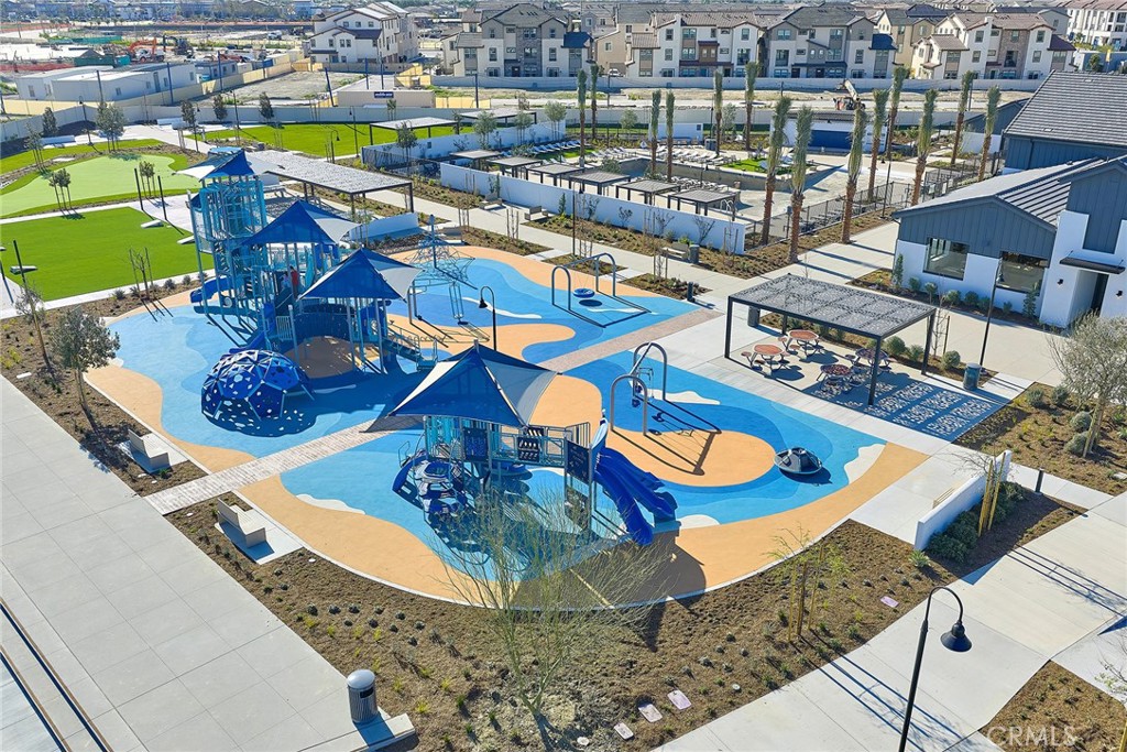 6059 Burren Way Eastvale, CA 92880 - Photo 30 of 30 an aerial view of a swimming pool with outdoor seating