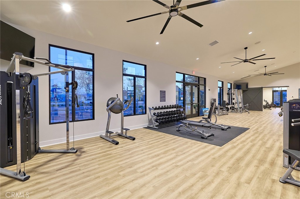 6059 Burren Way Eastvale, CA 92880 - Photo 8 of 30 a view of a room with gym equipment
