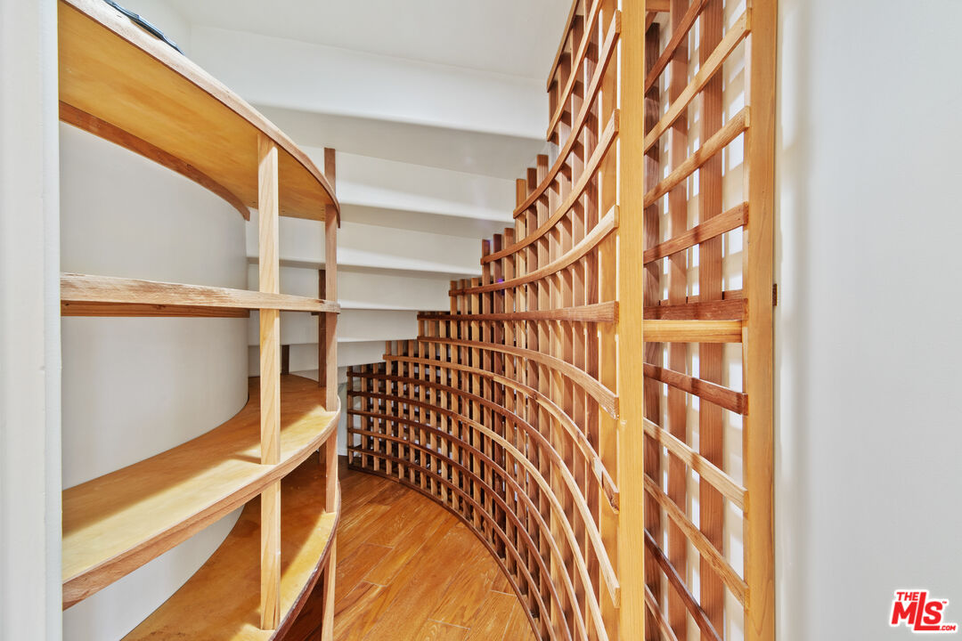 5958 Busch Drive Malibu, CA 90265 - Photo 8 of 39 a view of staircase with white walls and a window