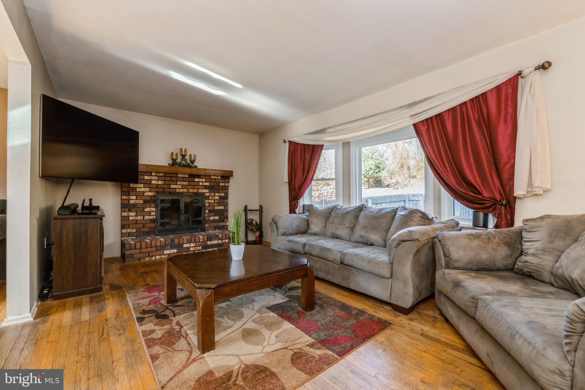 40 Willis Drive Ewing, NJ 08628 - Photo 11 of 39 Fireplace and Bay Window - perfect hangout spot...