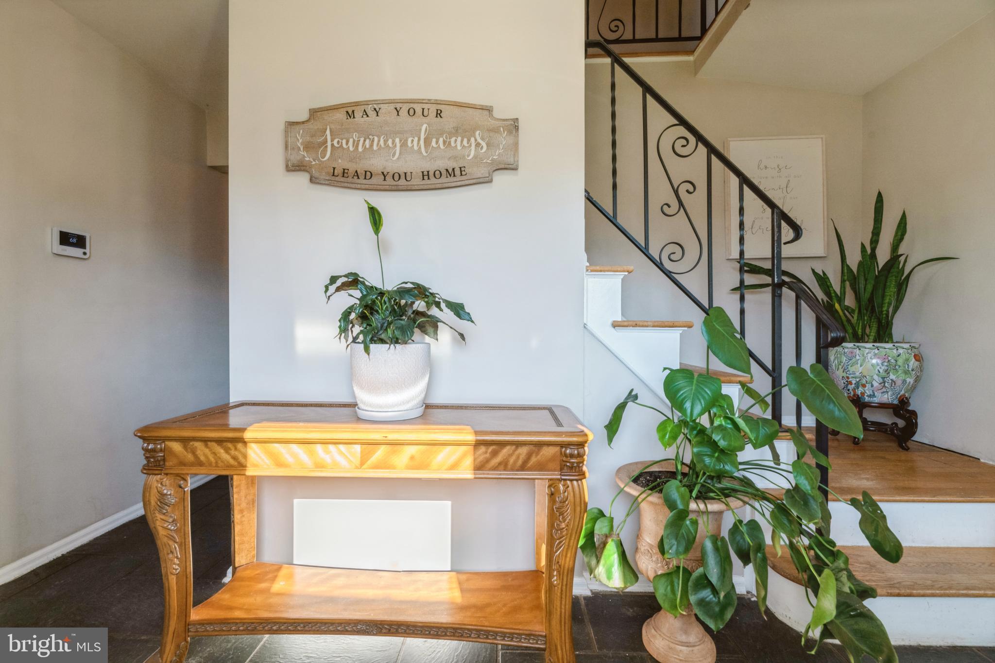40 Willis Drive Ewing, NJ 08628 - Photo 2 of 39 Welcoming Foyer with
iron rail on turned stairs