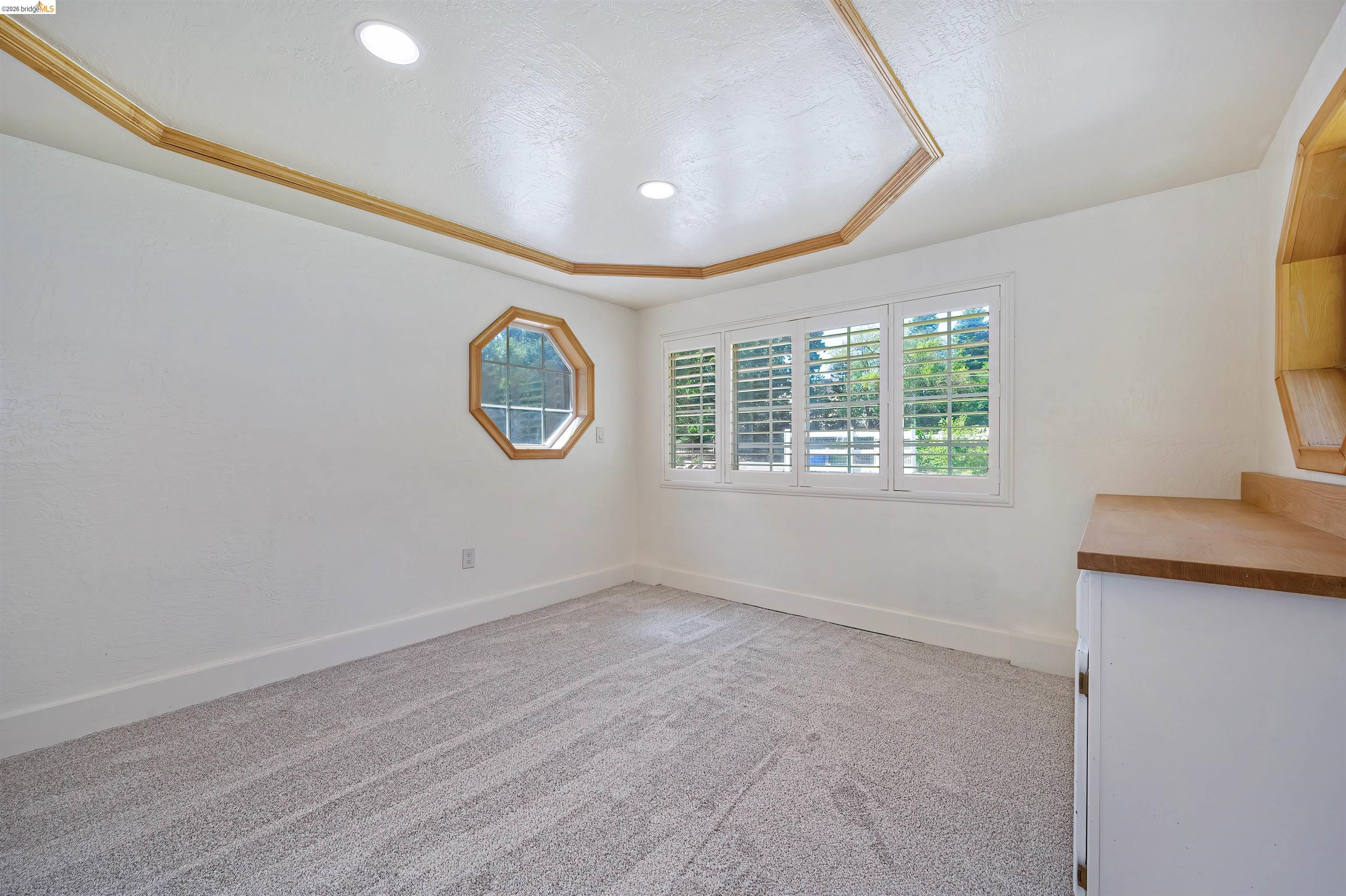 10474 Sheldon Road Elk Grove, CA 95624 - Photo 18 of 83 Bright interior space with light-toned carpeting and white walls