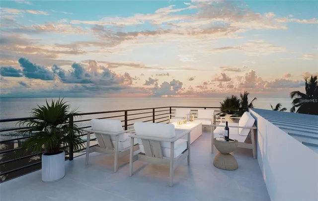 a view of a terrace with furniture