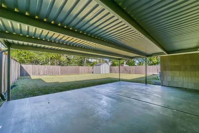 a view of backyard with green space