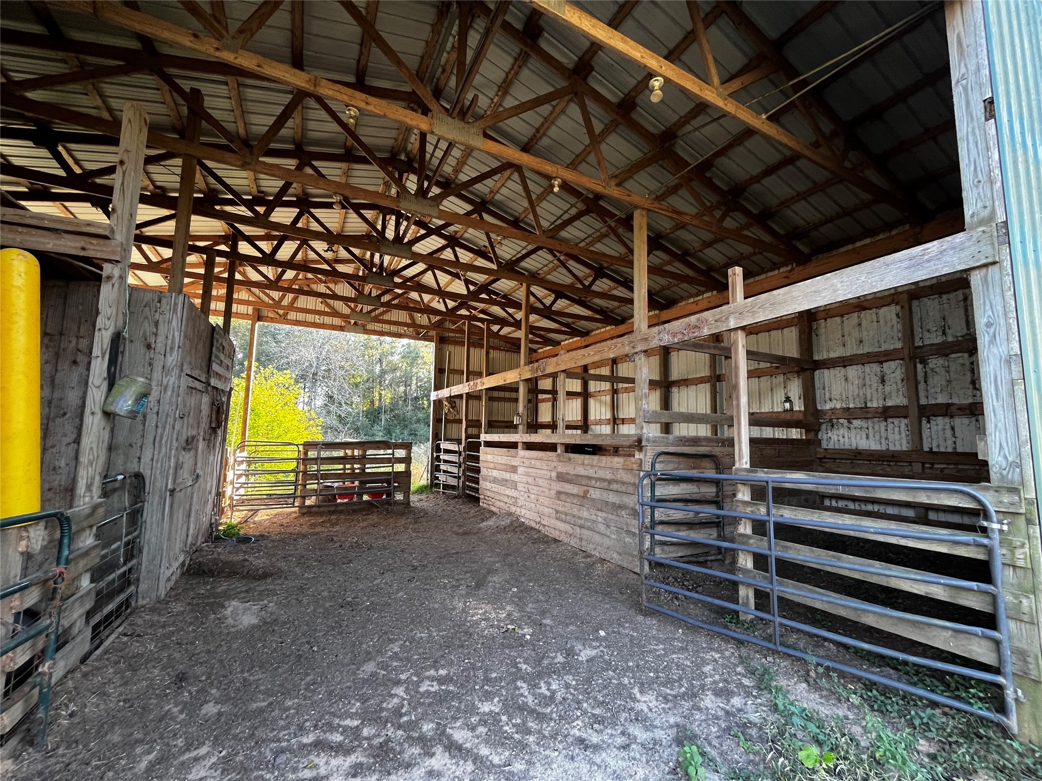 231 County Road 2190 Cleveland, TX 77327 - Photo 33 of 35 a view of storage and utility room