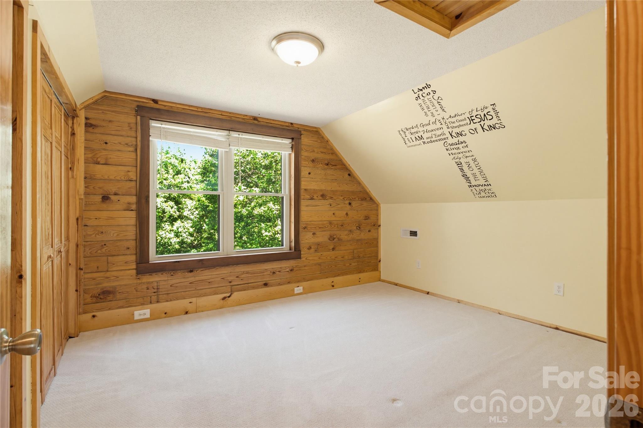 451 Rustic Ridge Drive Canton, NC 28716 - Photo 25 of 44 an empty room with a window