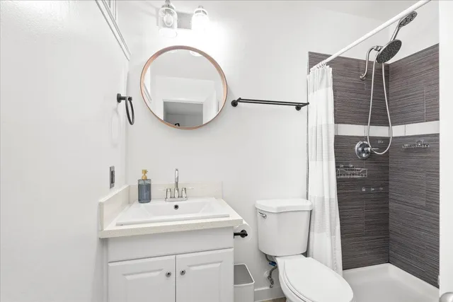 a view of a chair and table in backyard