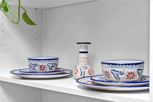 a view of a kitchen with a sink and a refrigerator