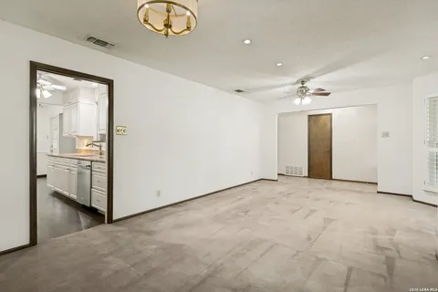 a view of a hallway with closet