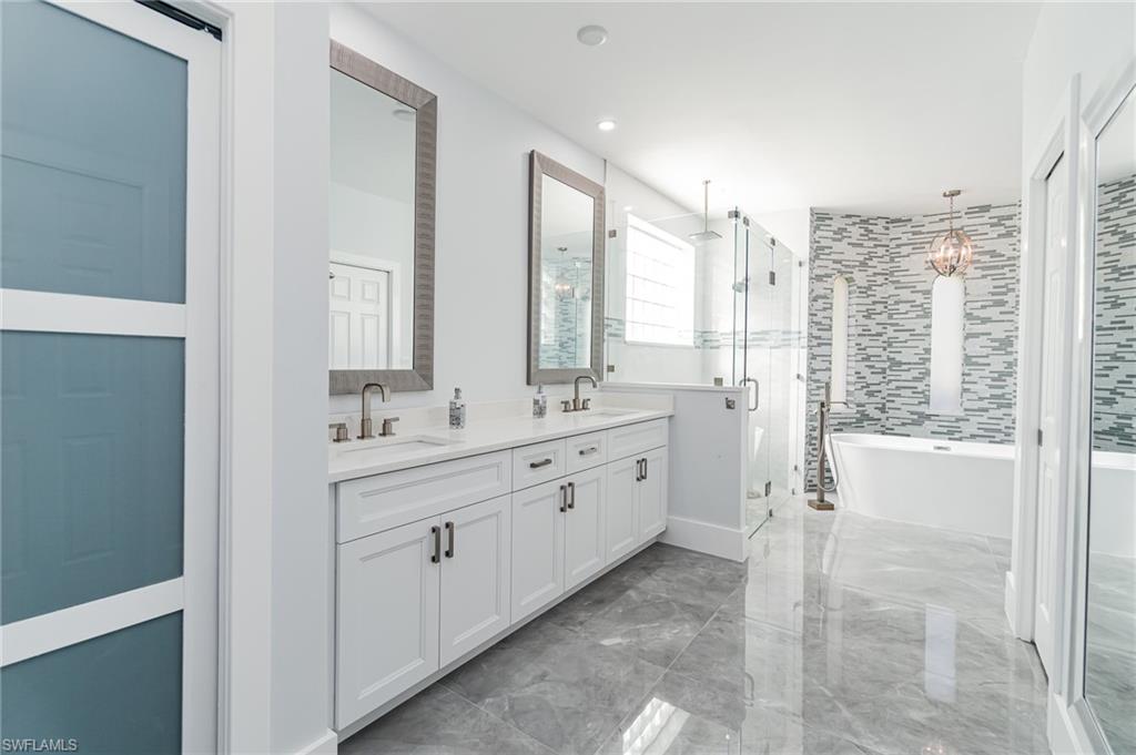6989 Mill Run Road Naples, FL 34109 - Photo 18 of 30 Owner's Bath