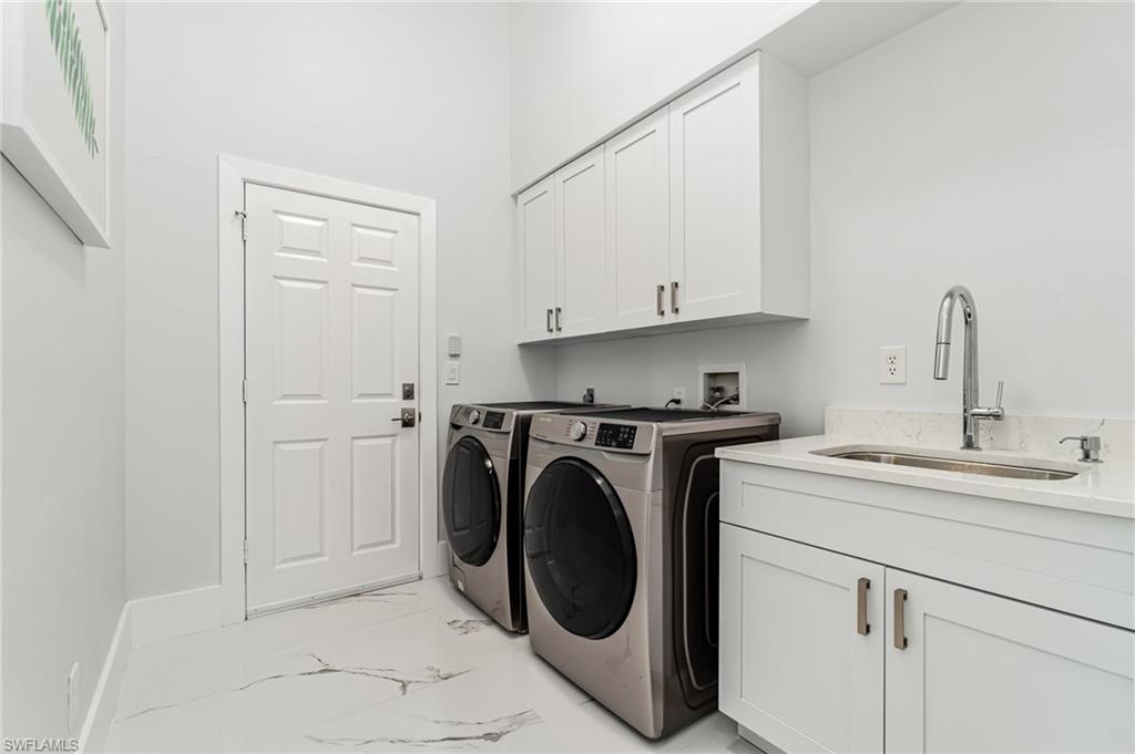 6989 Mill Run Road Naples, FL 34109 - Photo 28 of 30 Laundry into 3 Car Garage