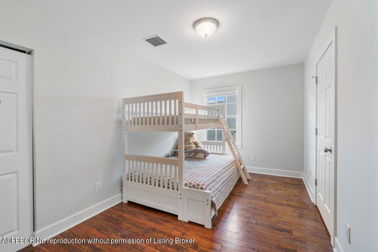 231 Argyle Road West Palm Beach, FL 33405 - Photo 12 of 17 a view of a room with wooden floor and windows