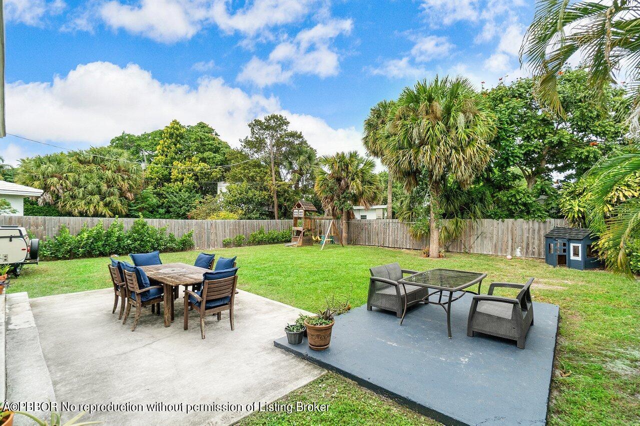 231 Argyle Road West Palm Beach, FL 33405 - Photo 17 of 17 a view of a backyard with furniture