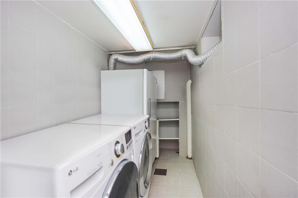 1730 East 4th Street Brooklyn, NY 11223 - Photo 23 of 24 a utility room with dryer and washer