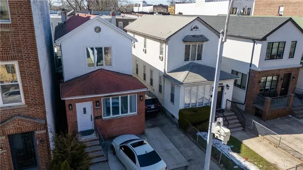 a aerial view of a house with a balcony