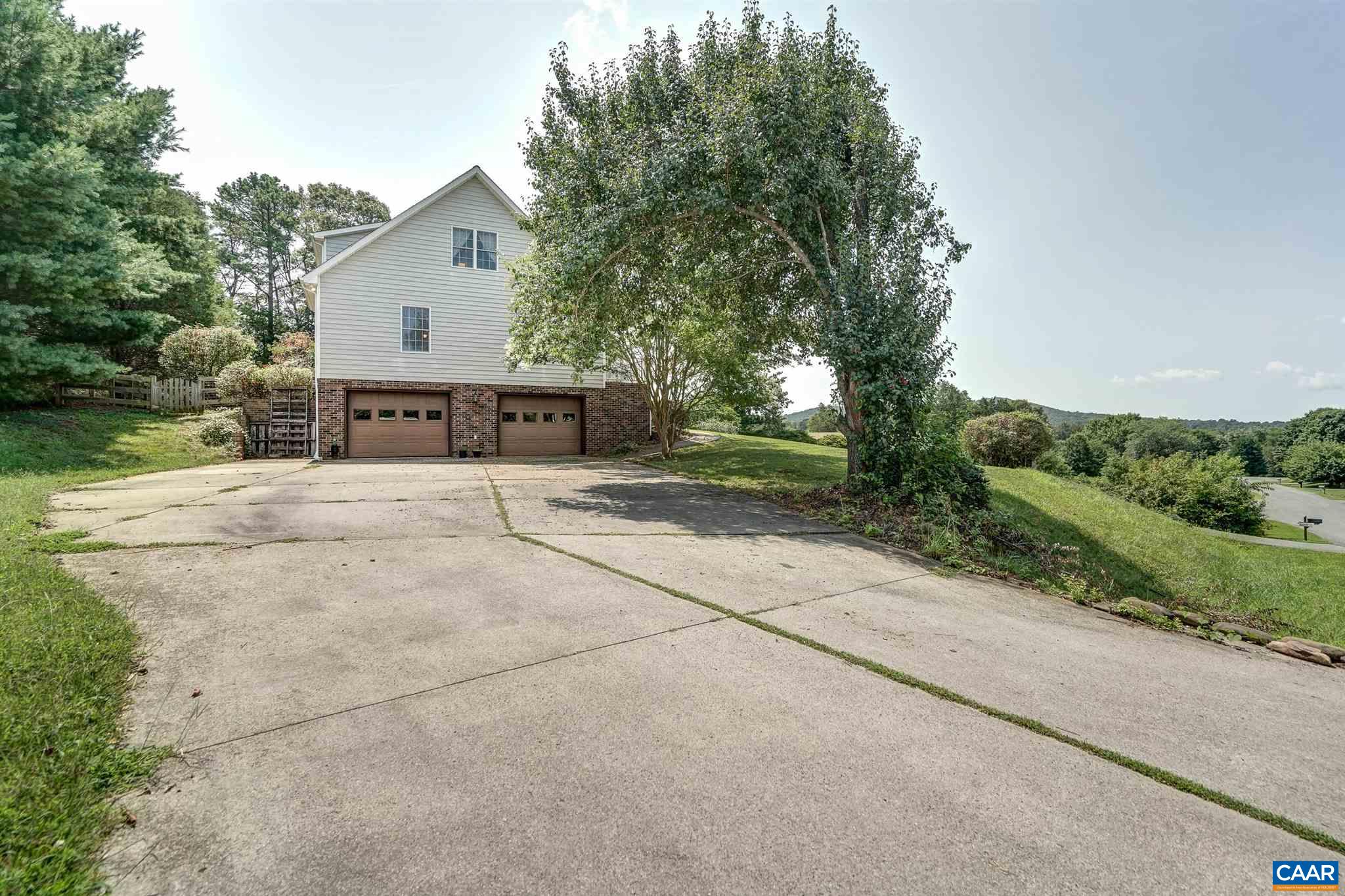 152 Spring Oaks Lane Ruckersville, VA 22968 - Photo 16 of 34 a view of house with outdoor space and street view