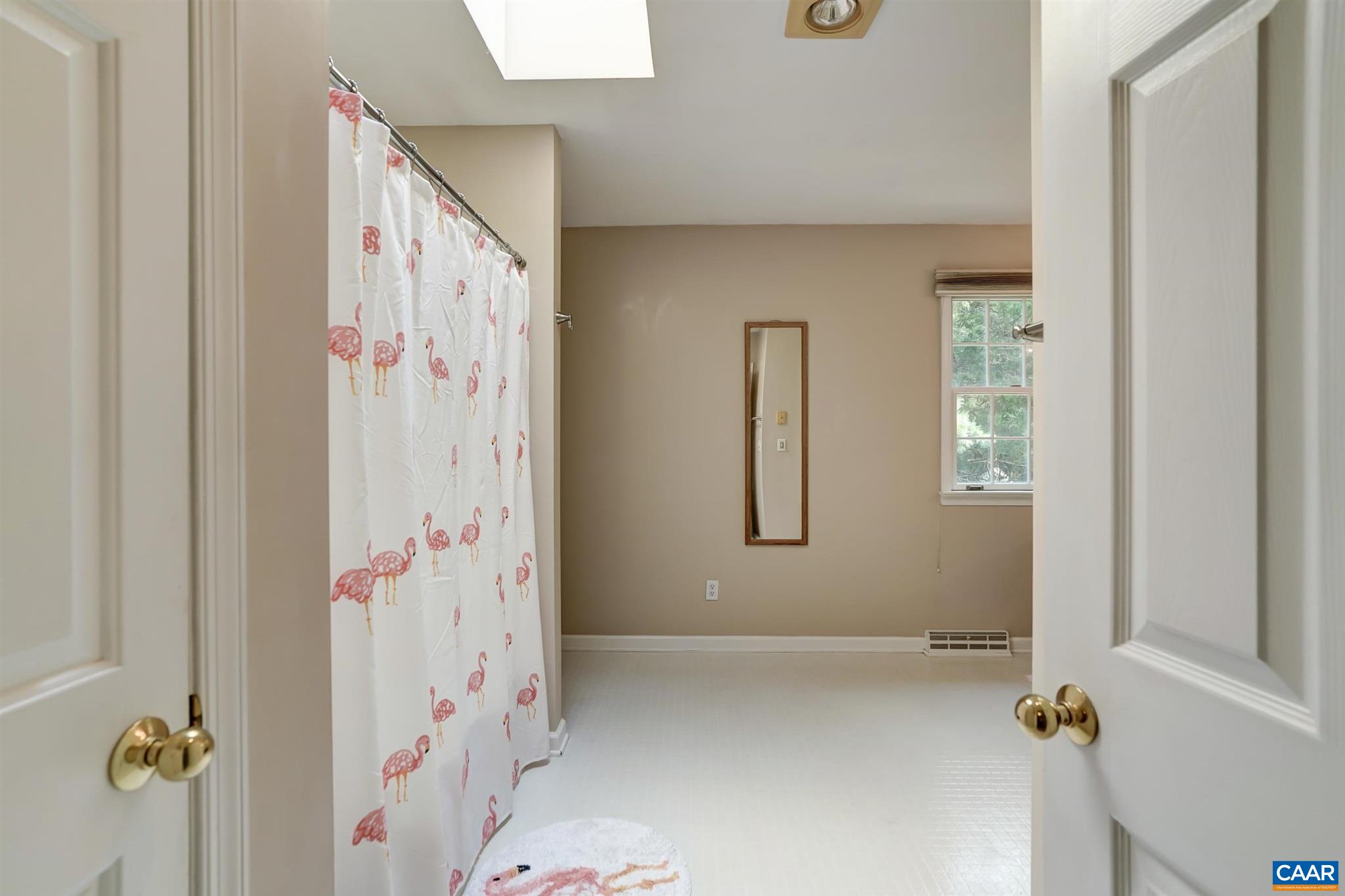 152 Spring Oaks Lane Ruckersville, VA 22968 - Photo 30 of 34 a bathroom with a shower and a shower curtain