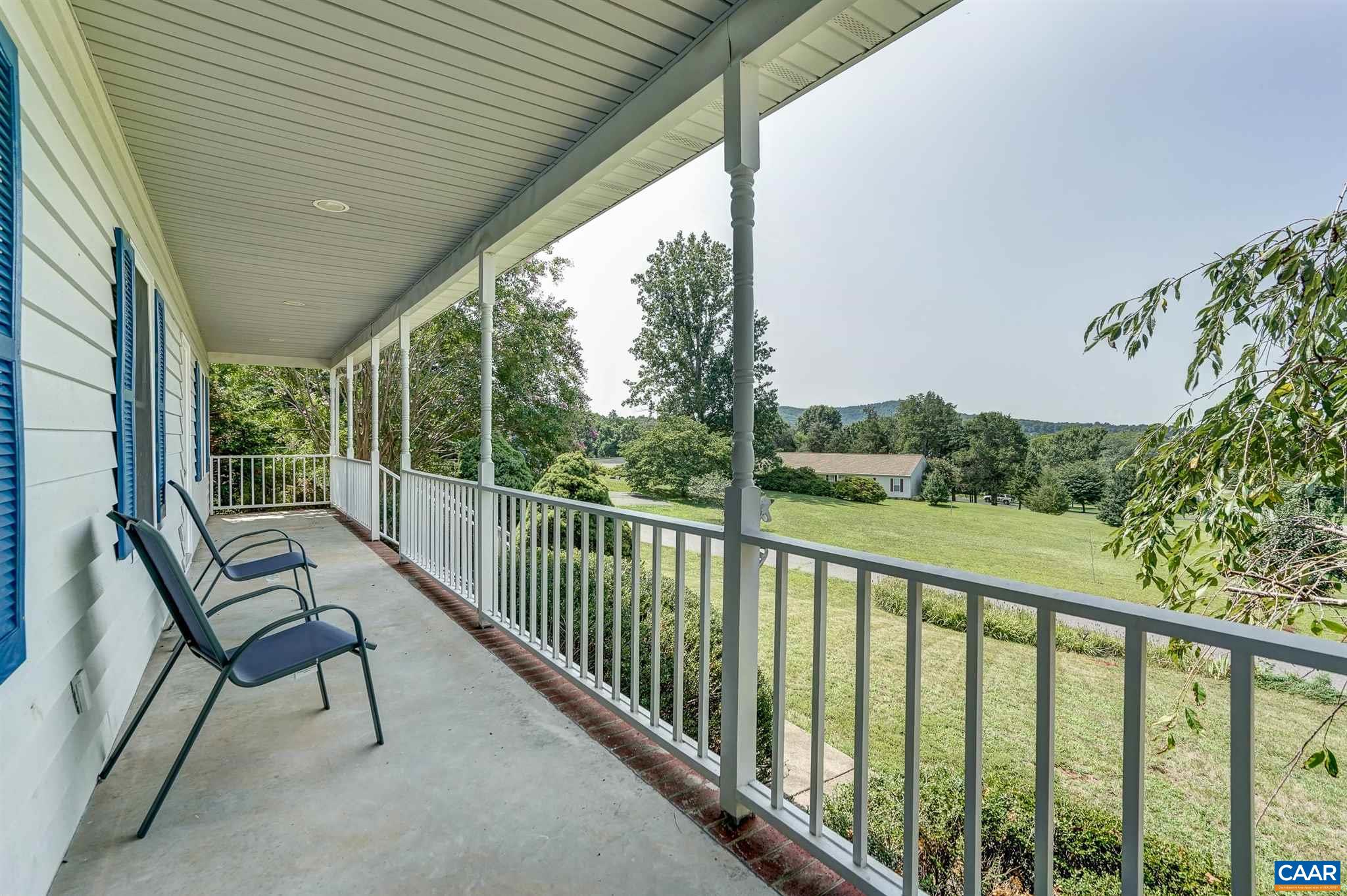 152 Spring Oaks Lane Ruckersville, VA 22968 - Photo 3 of 34 a view of a two chair in the balcony