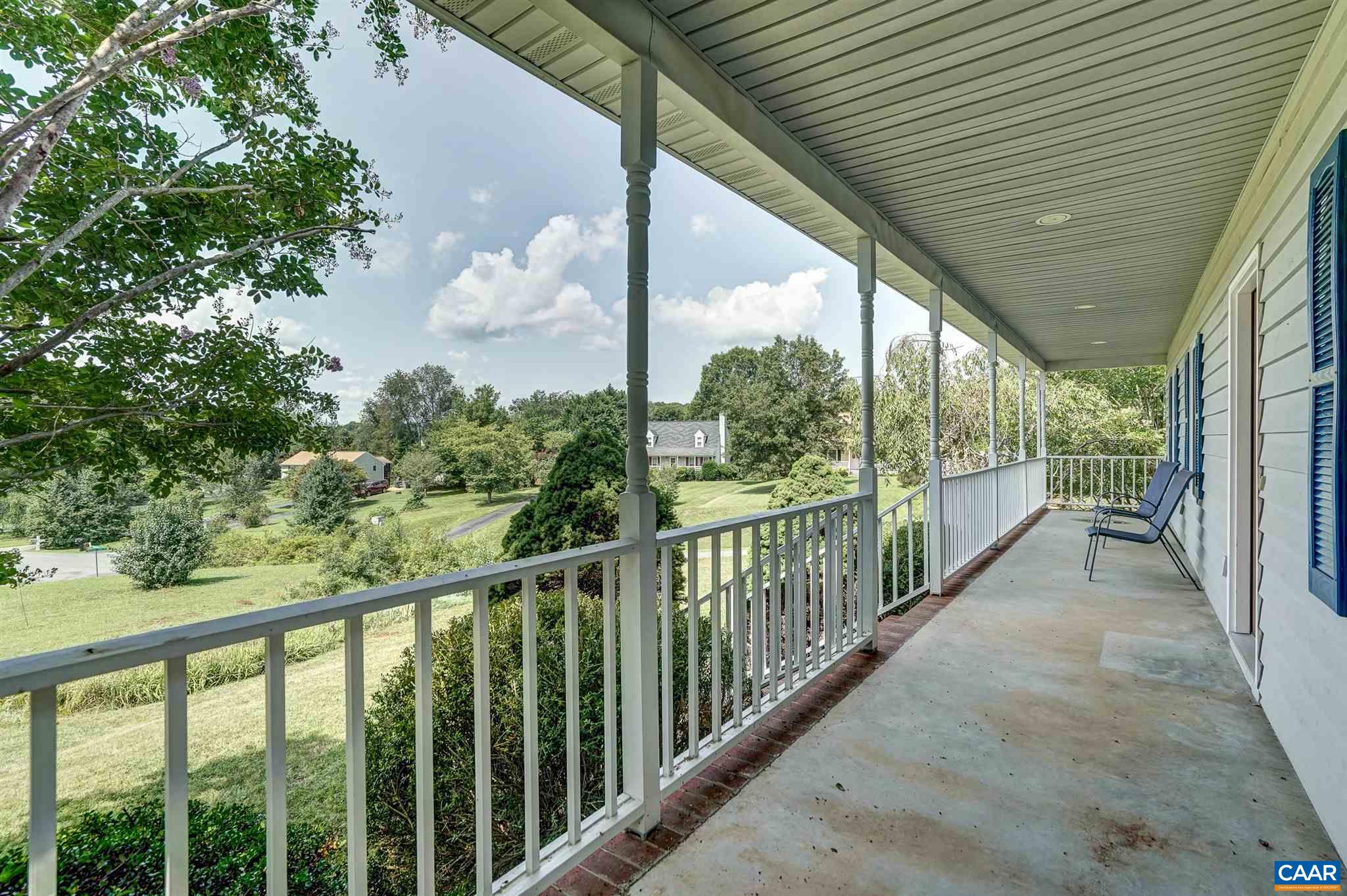 152 Spring Oaks Lane Ruckersville, VA 22968 - Photo 4 of 34 a view of a city from a balcony