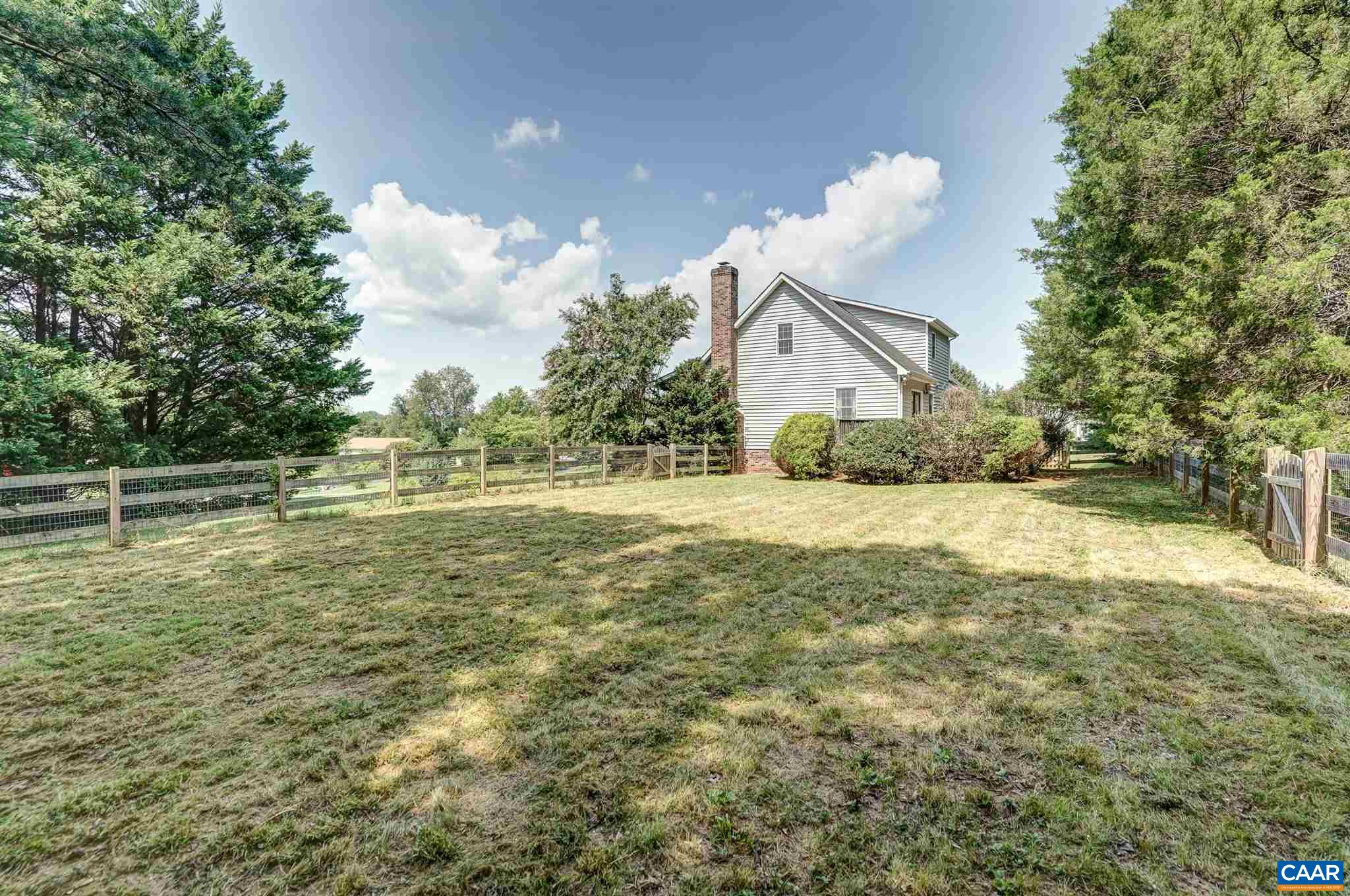 152 Spring Oaks Lane Ruckersville, VA 22968 - Photo 8 of 34 a view of a house with a yard