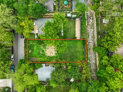 a view of a garden from a balcony