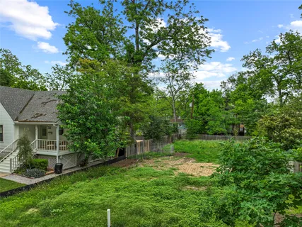 a view of a backyard with a garden