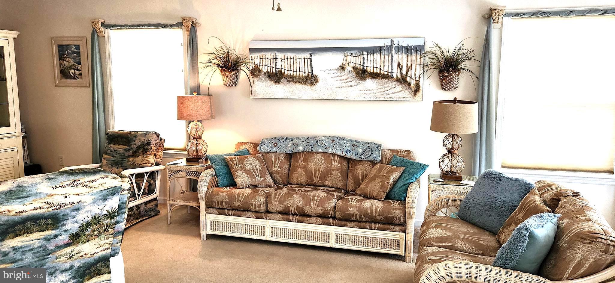 13322 Peachtree Road Ocean City, MD 21842 - Photo 14 of 54 a living room with furniture and a couch