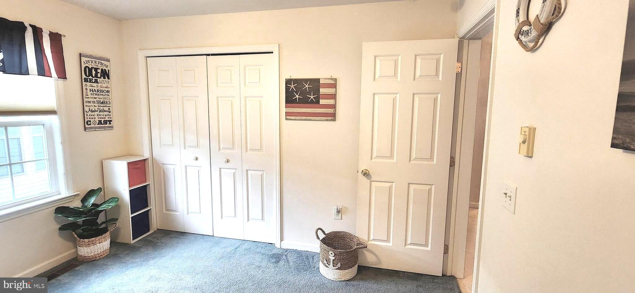 13322 Peachtree Road Ocean City, MD 21842 - Photo 34 of 54 a view of livingroom with furniture and windows