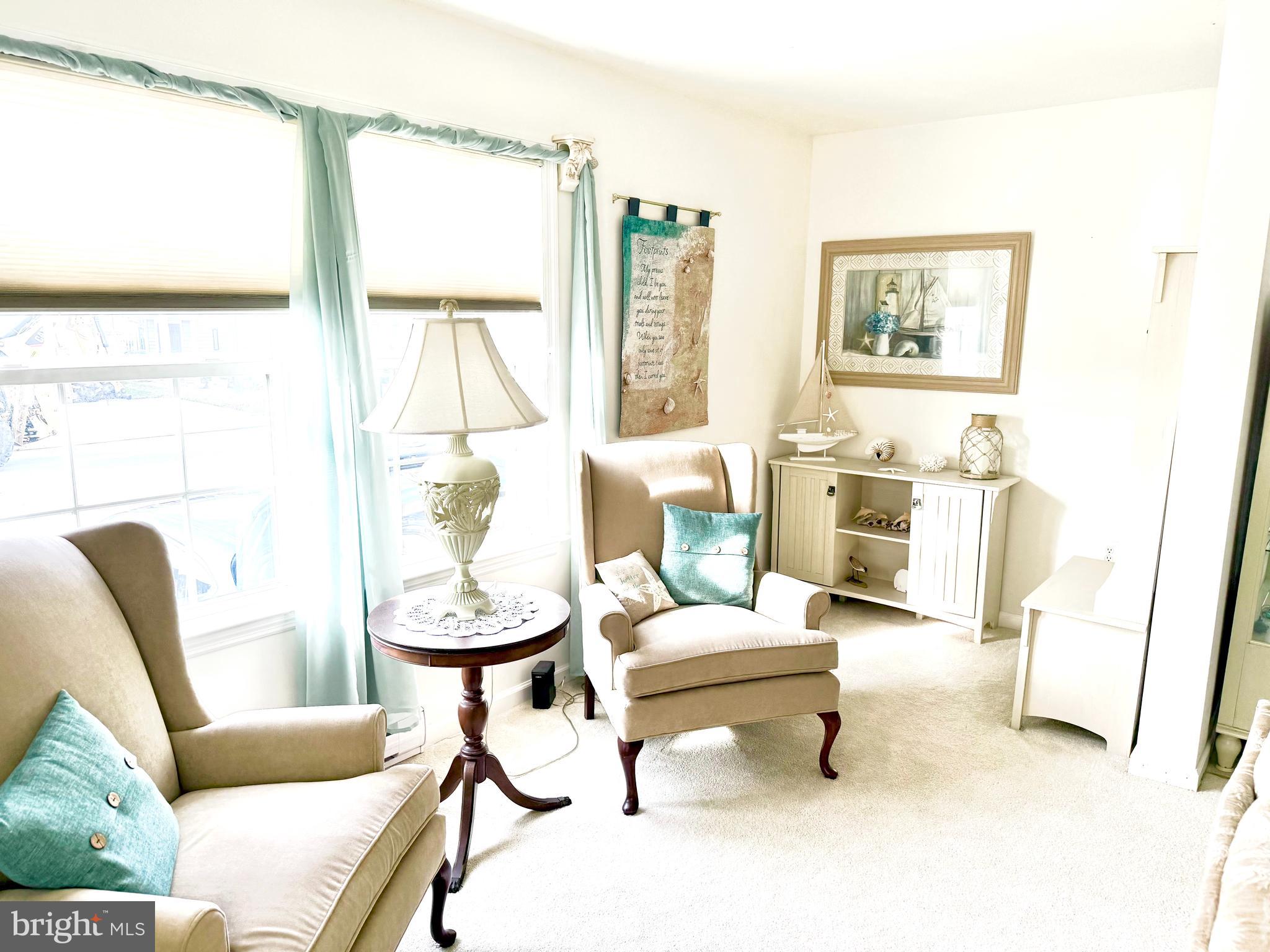 13322 Peachtree Road Ocean City, MD 21842 - Photo 10 of 54 a living room with furniture and a window