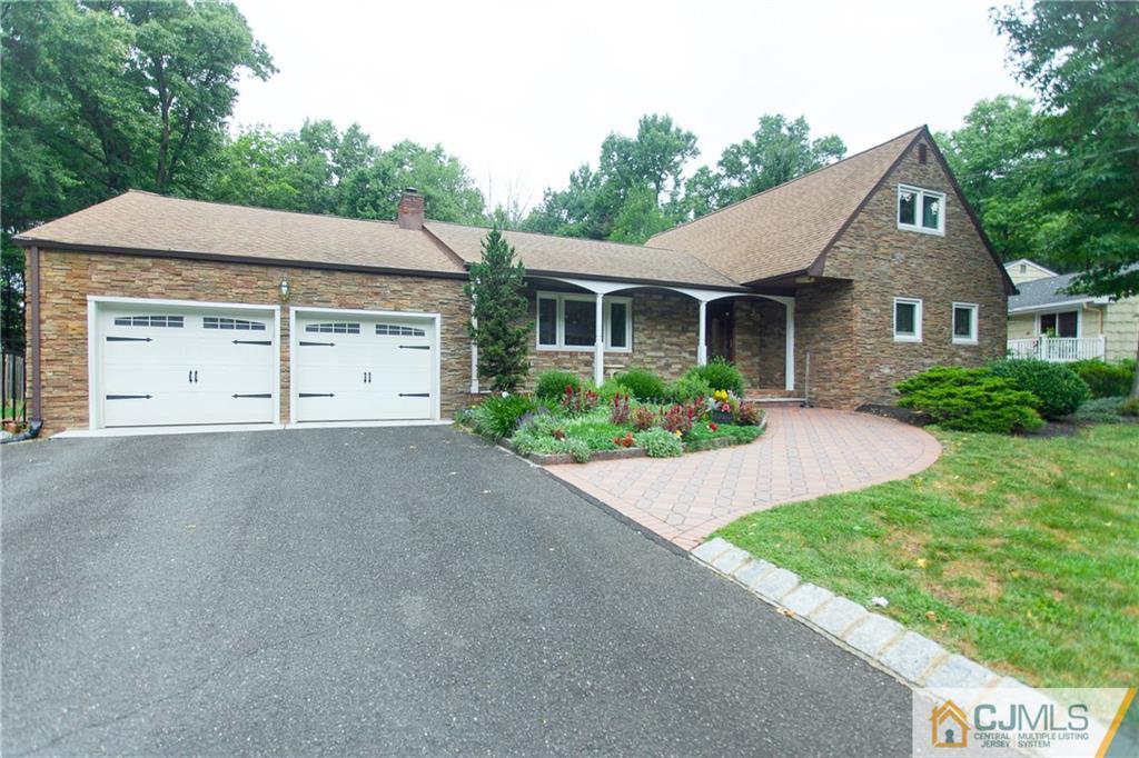 91 George Avenue Edison, NJ 08820 - Photo 1 of 21 front view of a house with a street